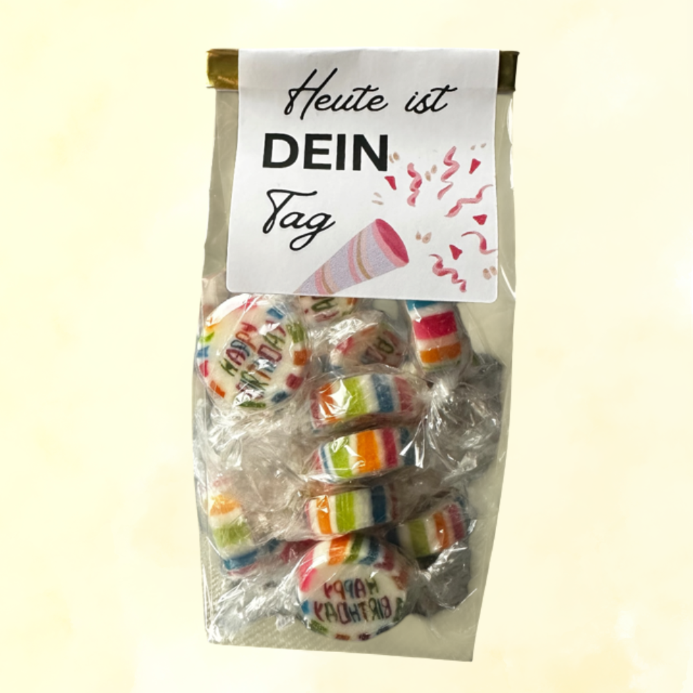 Fruchtige Kirsch-Bonbons in süßer Geburtstagstüte verschenken.